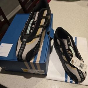 Men's Adidas Bad Bunny Mercedes F1 Adiracer GT Black, White, and Gold Sneakers